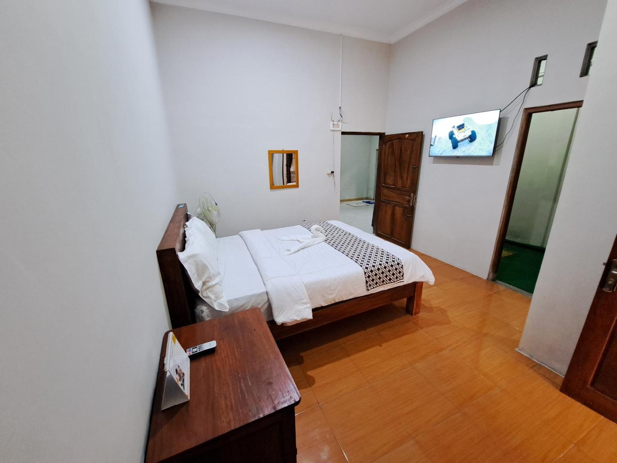 Romadhoni Homestay Magelang Værelse billede